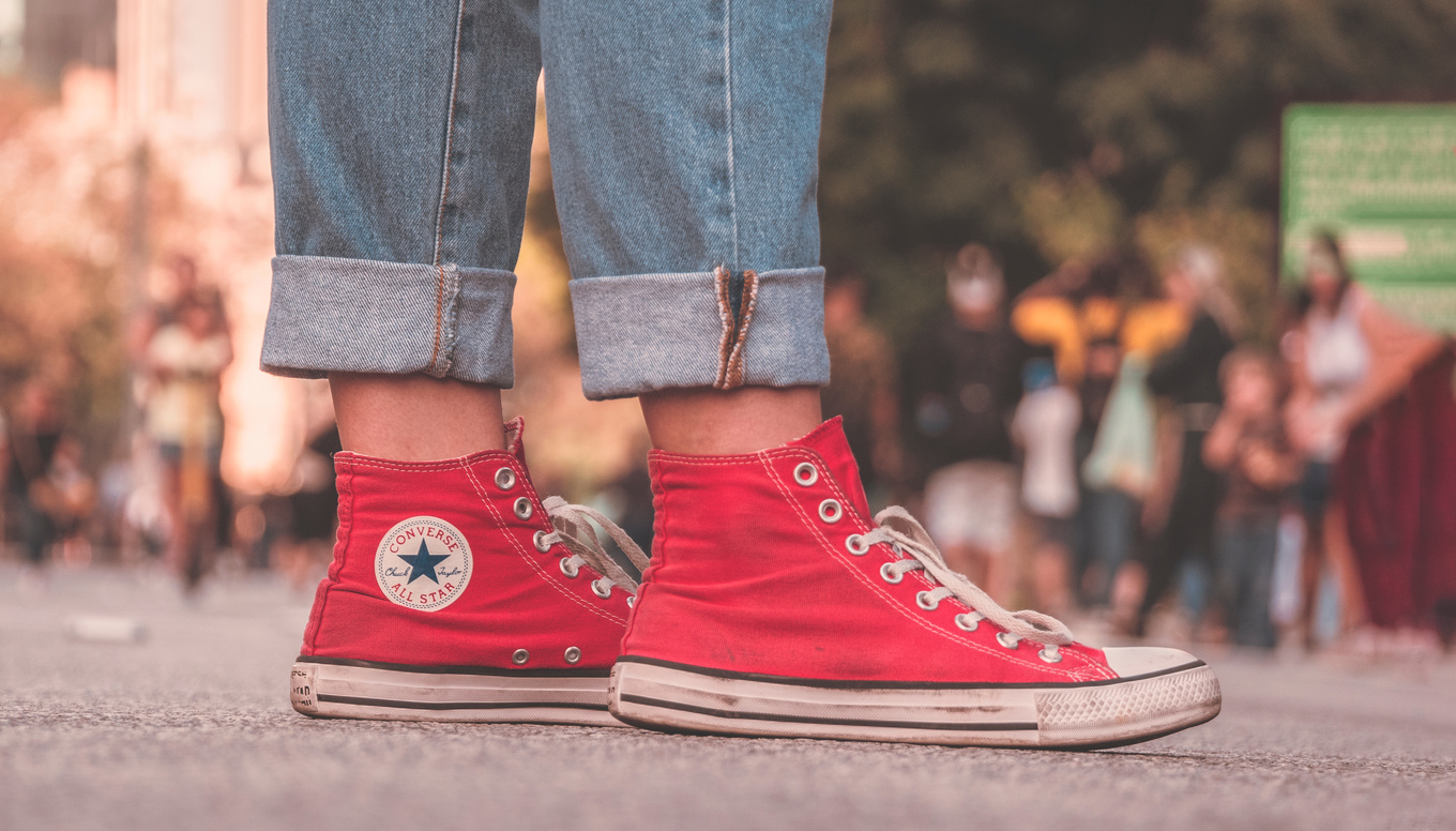 Person In Red Converse All Star High Top Sneakers